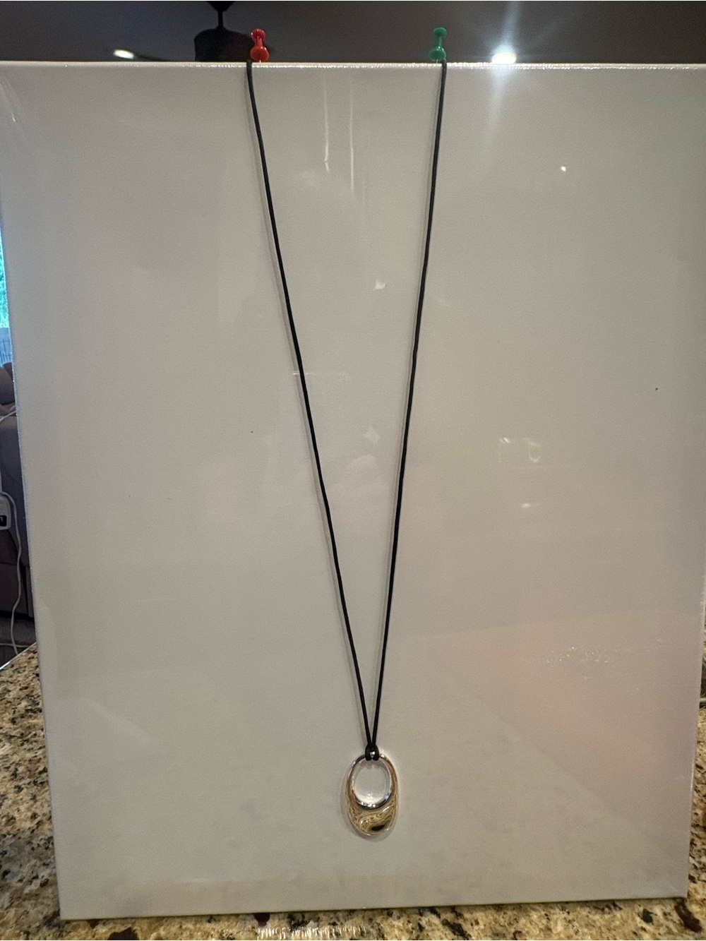 Classic Silver Oval Pendant Necklace on Black Cord
